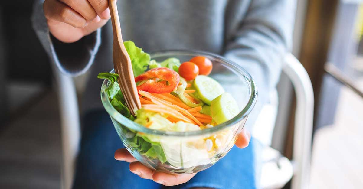 woman easting a salad